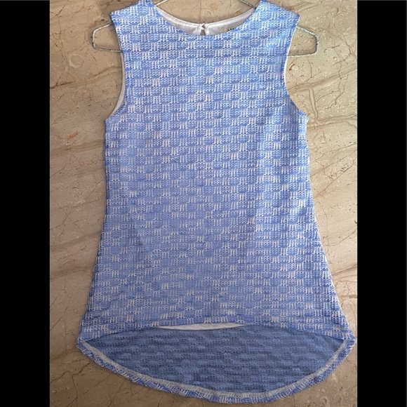 AND Thread work sleeveless top